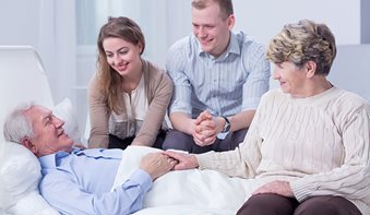 Care for the Vulnerable - Elderly woman carring for vulnerable toddler